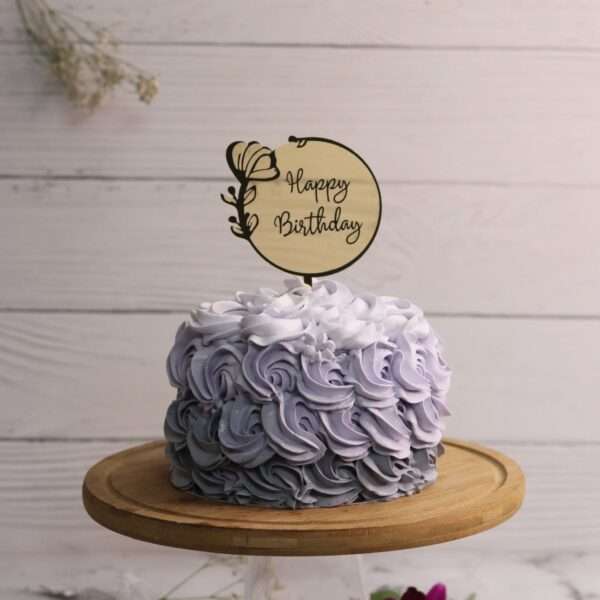 Blue ombre rosette cake with happy birthday topper