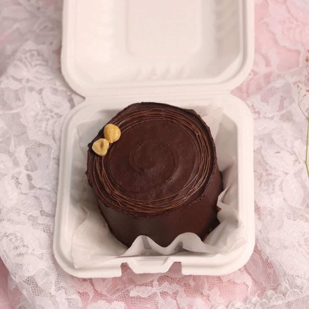 chocolate hazelnut ganache bento cake with hazelnuts