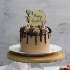 Chocolate drip cake with oreo and chocolate mousse garnishing