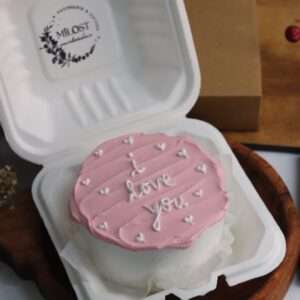 A white and pink bento cake ,a mini cake with white heart
