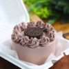 Chocolate Oreo bento cake with swirls piping