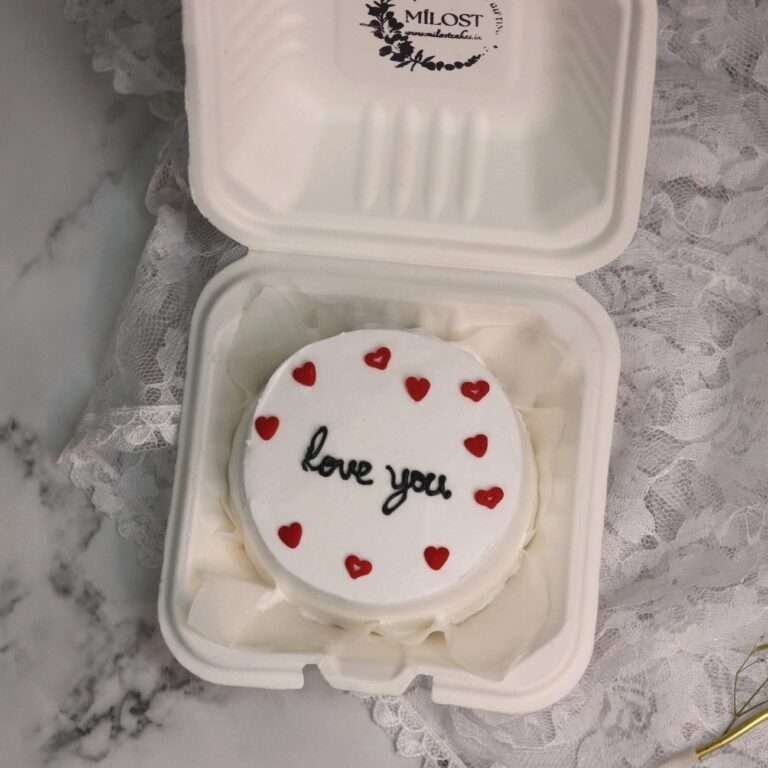 white bento cake with hearts