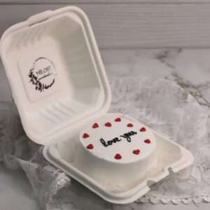white bento cake with hearts