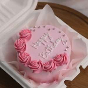 Pink bento cake with swirls